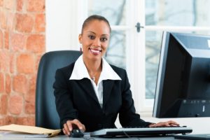 Woman in office sitting on the computer