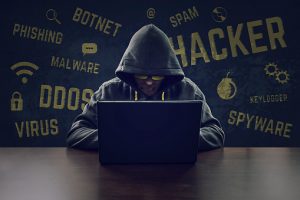 Cyber criminal stealing secrets with laptop