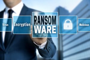Ransomware touchscreen is operated by businessman