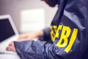 FBI using laptop - Cybersecurity
