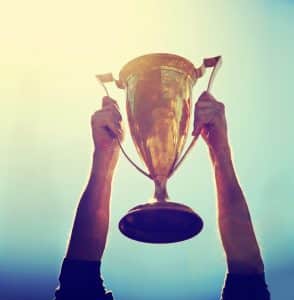 person holding trophy